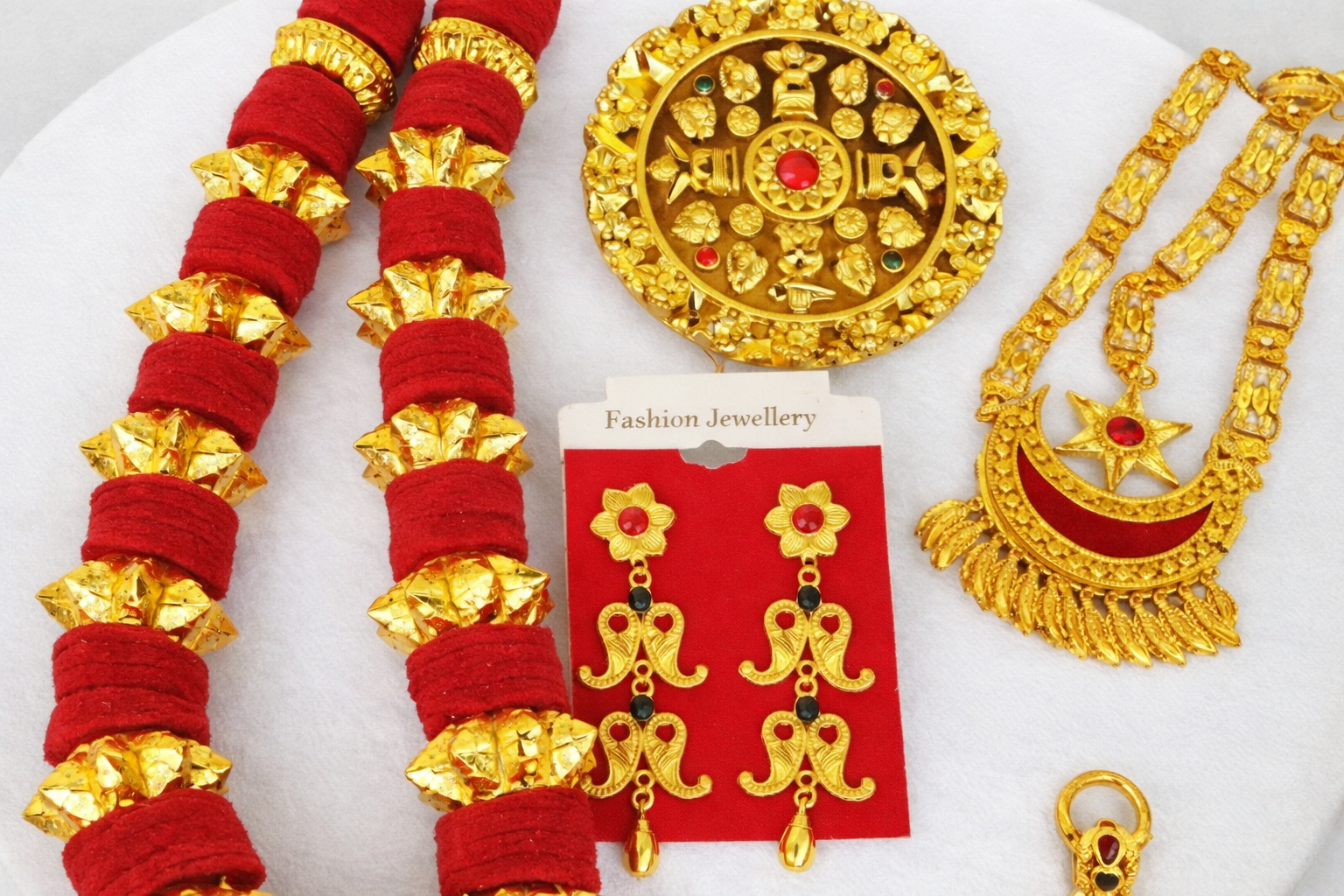 Traditional Nepali gold jewelry including necklaces, bangles and earrings